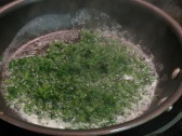 parsley sauteeing in butter.