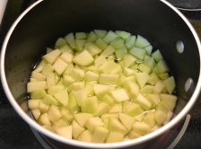 Apples in water, ready to boil.